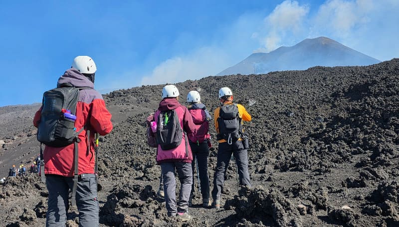 Etna 3000 South Cable Car Hike - High-altitude guided hike on Etna south side with round-trip cable car, lava tunnel visit, and Barbagallo craters up to 3000 m. Etna 3000 South Cable Car Hike